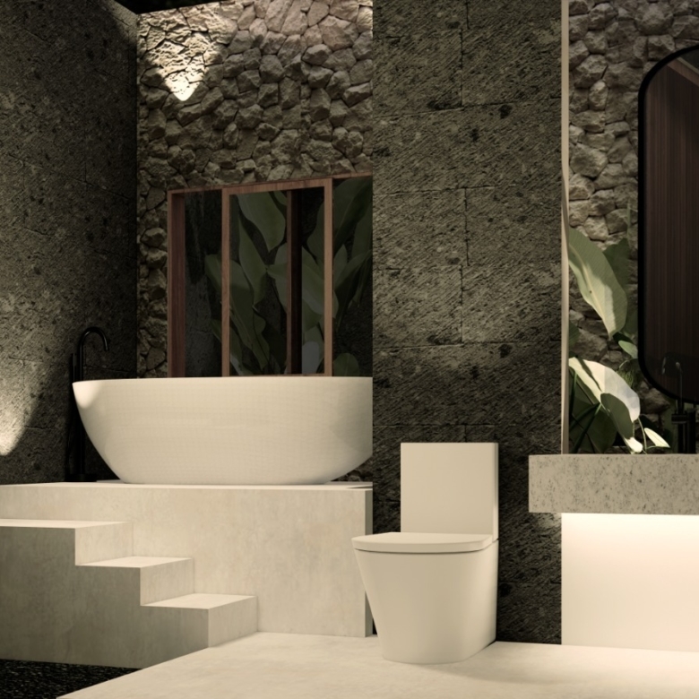 Luxurious modern bathroom with a white freestanding tub on a raised concrete platform, dark stone walls, and a backlit vanity area with a large oval mirror reflecting tropical plants.