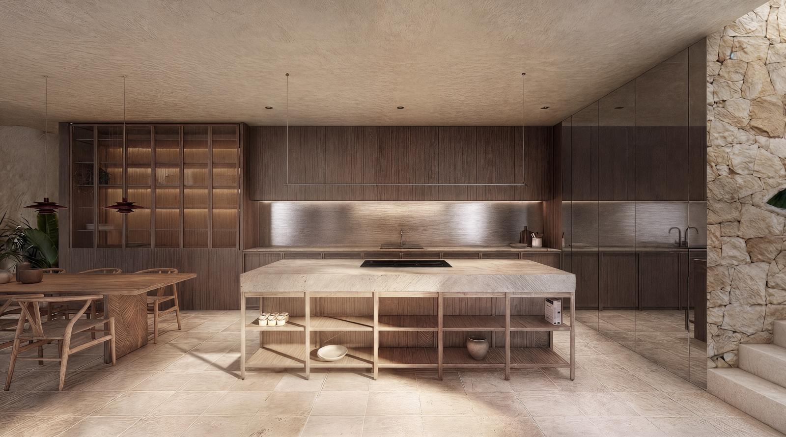 Open-concept kitchen with a large island, wooden cabinetry, and stone wall on the right.